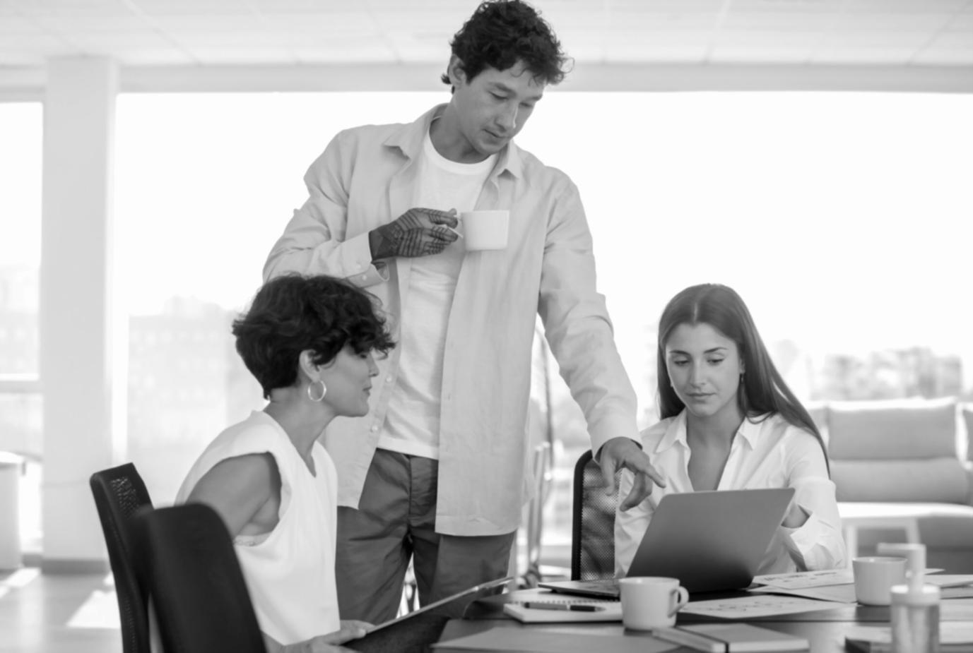 Finance professionals collaborating in modern office environment